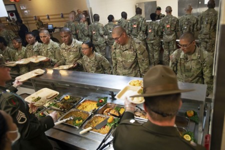 Drill sergeants serve a holiday meal to trainees at Fort Jackson, S.C., Nov. 23, 2022.
