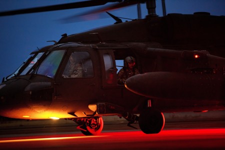 An Army UH-60 Blackhawk helicopter taxis along the flight line after refueling during Exercise Falcon Autumn 22 at Vredepeel, Netherlands, Nov. 7, 2022.