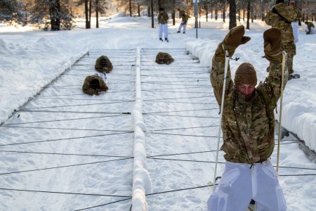 Soldiers from Charlie Troop, 3-71 Cavalry Regiment, 1st Brigade Combat Team, 10th Mountain Division, compete in a relay race executing low crawls on skis during Exercise Arctic Forge in Sodankyla Garrison, Finland on Feb. 21, 2023. Exercise Arctic Forge 23 is a U.S. Army Europe and Africa led umbrella exercise that leverages the host-nation exercises Defense Exercise North in Finland, and exercise Joint Viking in Norway, taking place Feb. 16 through March 17, 2023, focused on building capabilities and cooperation in support of the U.S. Army&#39;s Arctic Strategy.