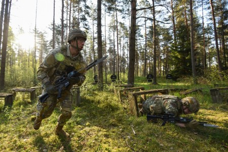 U.S. Army Lt. Col. Ari Martyn, left, commander of 1st Squadron, 91st Cavalry Regiment, 173rd Airborne Brigade, leads his officers through the Bayonet Assault Course at the 7th Army Training Command&#39;s Grafenwoehr Training Area, Germany, May 5, 2023.