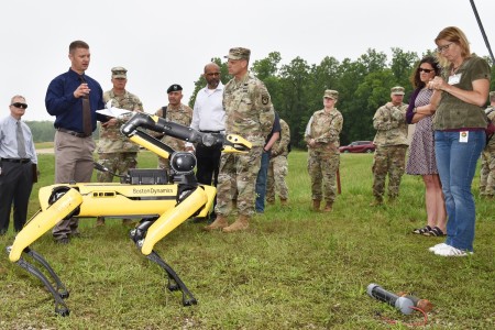 Kyle Henry, the Maneuver Support Battle Lab’s Experimentation Branch chief, talks about the Spot robot, an agile mobile robot that specializes in navigating different terrains during the MSSPIX’23 demonstration day on Tuesday at Range 19. 